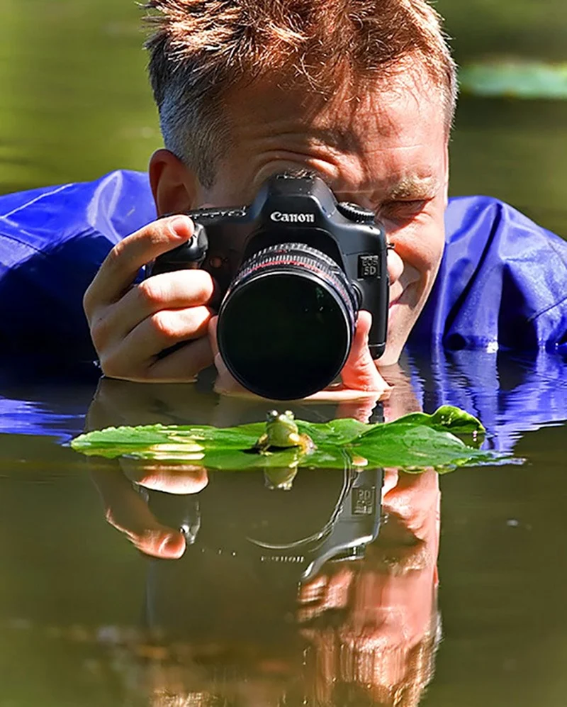 Человек с фотоаппаратом