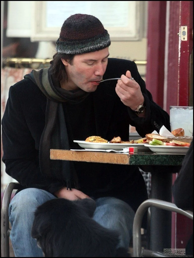 Keanu Reeves eating