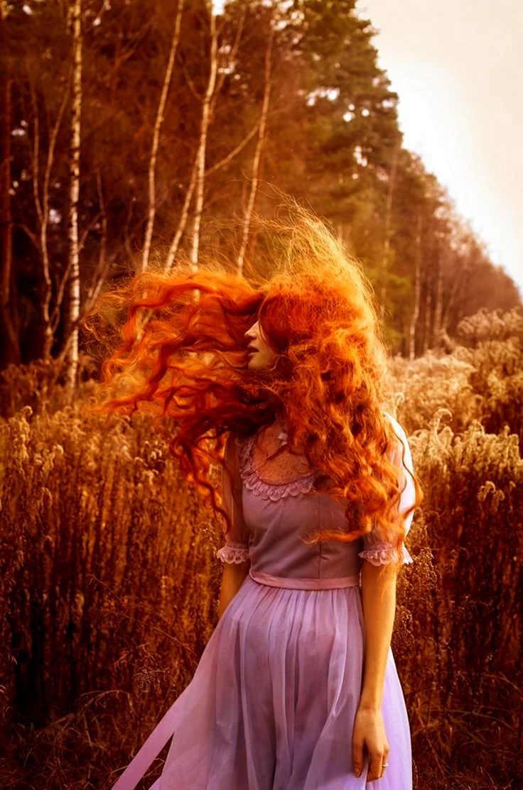 Красивые длинные рыжие волосы