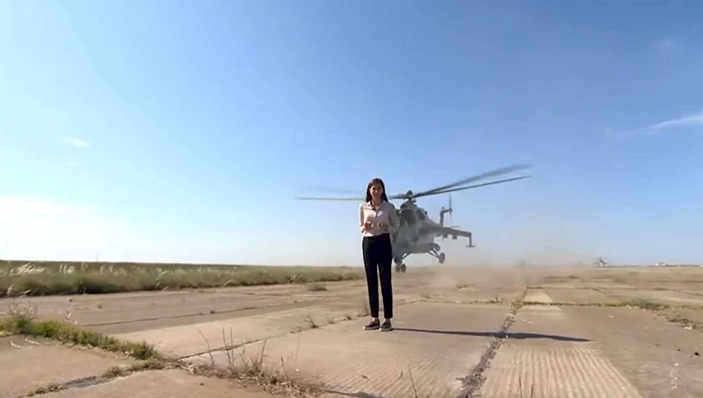 Ми-24 возле журналистки