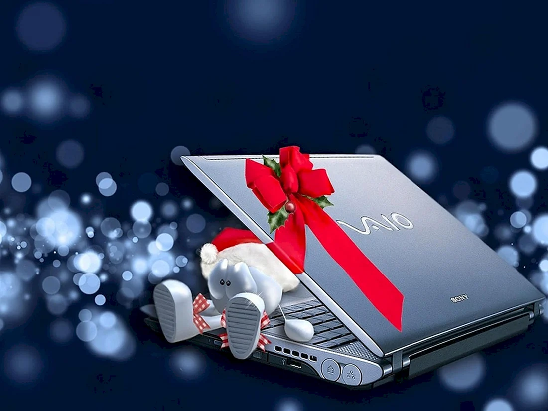 Ноутбук с новогодними подарками