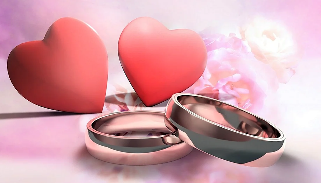 Свадебные кольца в сердце